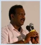 Prabhu at microphone